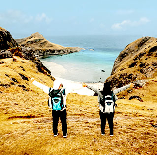photo of a young couple hiking